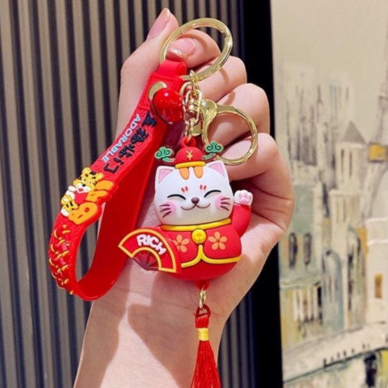 Móc Khóa Mèo Thần Tài Có Dây Silicone Size Lớn