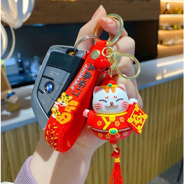 Móc Khóa Mèo Thần Tài Có Dây Silicone Size Lớn