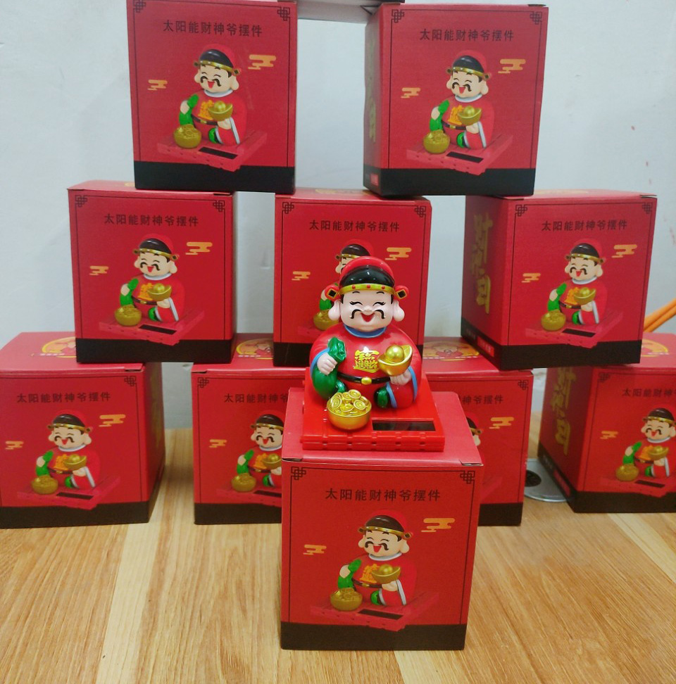 Thần Tài Năng Lượng Cầm Thỏi Vàng