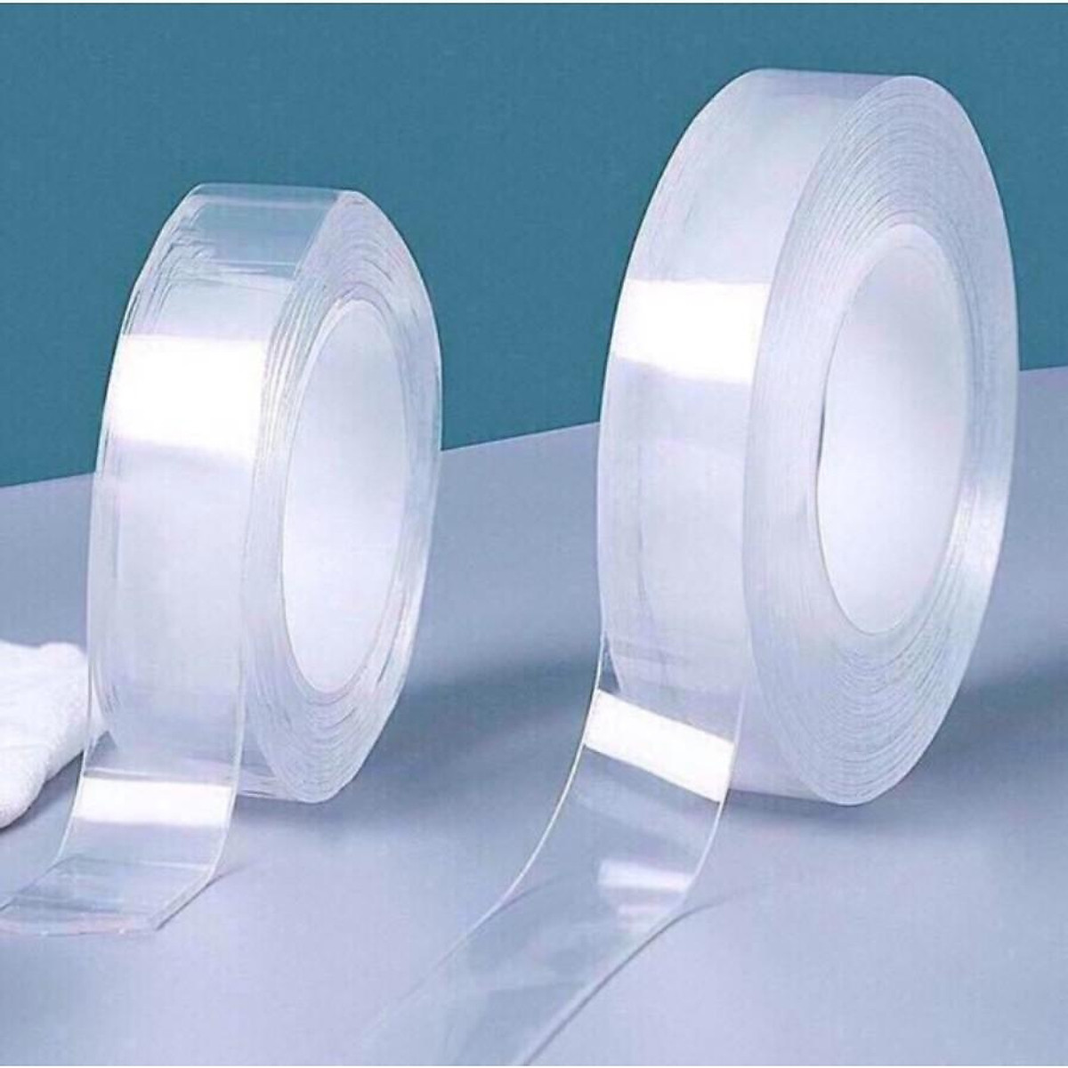 Loại Dài 5M: Băng Keo, Băng Dính Dán Nano 2 Mặt Siêu Dính Trong Suốt 5 Mét Ko Hộp (T180) Loại Dài 5M: Băng Keo, Băng Dính Dán Nano 2 Mặt Siêu Dính Trong Suốt 5 Mét Ko Hộp (T180)