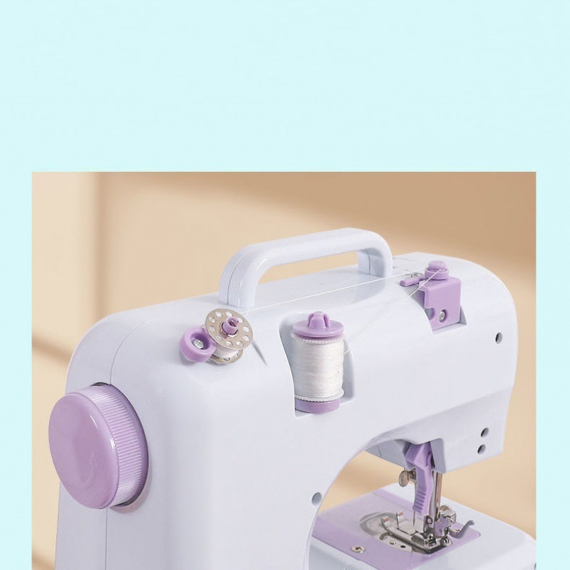 Máy May Mini Gia Đình 12 Kiểu May, Có Vắt Sổ Kèm Bàn Mở Rộng Máy May Mini Gia Đình 12 Kiểu May, Có Vắt Sổ Kèm Bàn Mở Rộng